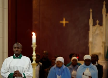 Congregants attend Sunday Mass at Zimbabwe's founding father Robert Mugabe's church in Harare