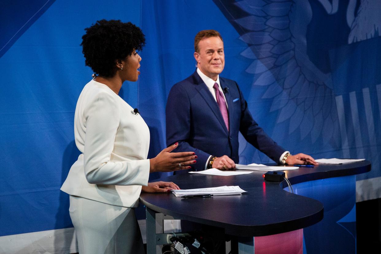 Moderators Rheya Spigner and Steve Karlin introduce U.S. Sen. Joni Ernst and Theresa Greenfield preceding a senatorial debate on Oct. 15, 2020 streamed at Franklin Jr. High in Des Moines.