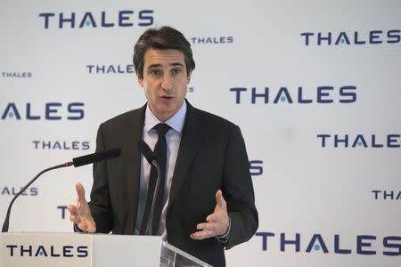 Patrice Caine, newly appointed Chairman and Chief Executive of Thales, speaks during the presentation of the company's 2014 results at their headquarters in La Defense business district near Paris, February 26, 2015. REUTERS/Philippe Wojazer