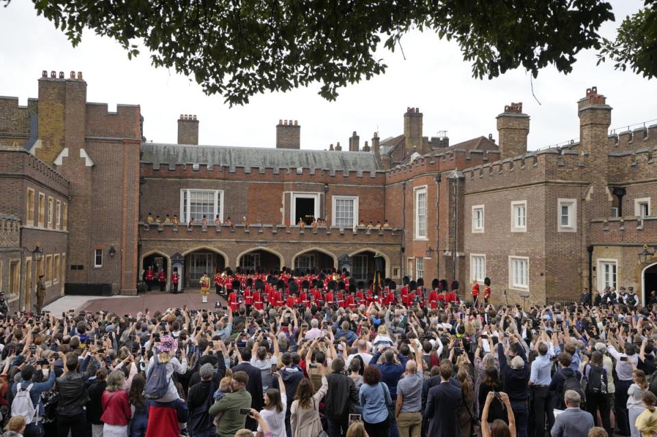 Around 1,000 members of the public were invited into the palace grounds to watch (Kirsty Wigglesworth/PA) (PA Wire)