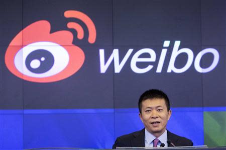 Weibo Corporation Chairman Charles Chao speaks during a visit to the NASDAQ MarketSite in Times Square in celebration of Weibo's initial public offering (IPO) on The NASDAQ Stock Market in New York April 17, 2014. REUTERS/Andrew Kelly