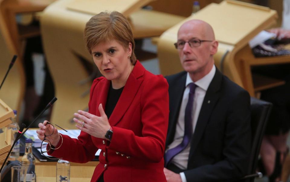 Nicola Sturgeon and John Swinney suggested wearing face masks would not be required while dancing in nightclubs - Fraser Bremner - Pool/Getty Images