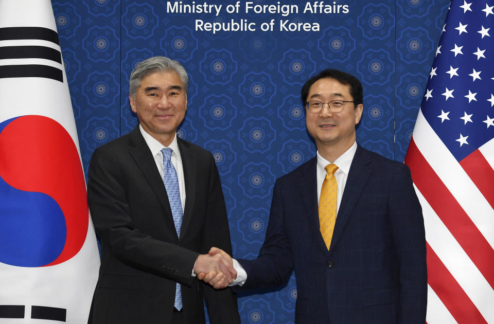 U.S. Special Representative for North Korea, Sung Kim, left, shakes hands with South Korea's Special Representative for Korean Peninsula Peace and Security Affairs Kim Gunn, prior to a meeting at the Foreign Ministry Thursday, April 6, 2023 in Seoul, South Korea. (Song Kyung-Seok/Pool Photo via AP)