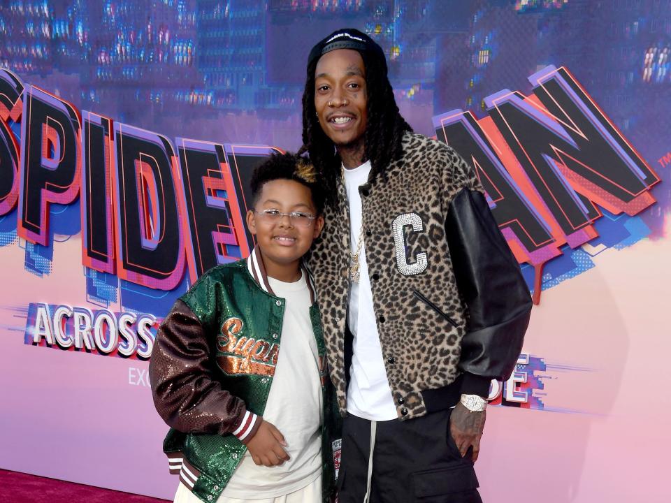 Wiz Khalifa and son attend the World Premiere Of Sony Pictures Animation's "Spider-Man" Across The Spider Verse" held at Regency Village Theatre on May 30, 2023 in Los Angeles, California.