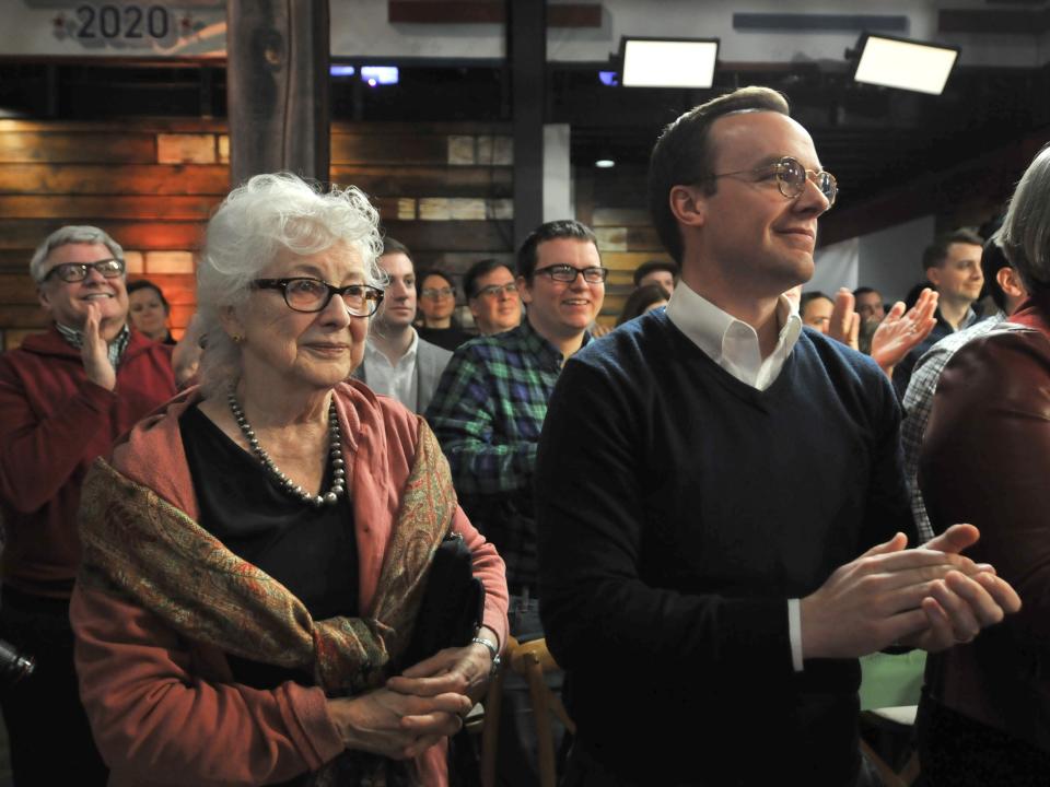 chasten buttigeg and anne buttigieg in an audience