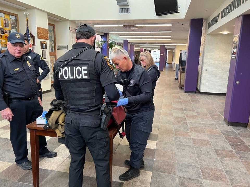 ESASD security and members of law enforcement search bags as students walk through metal detectors at the South high school on the morning of March 30. Stroud Twp. police, Stroud Area Regional Police, and state police were all on hand as the school investigated a threat that came in via an anonymous Safe2Say tip.