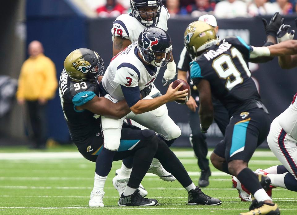 Sep 10, 2017; Houston, TX, USA; Houston Texans quarterback Tom Savage (3) is sacked by Jacksonville Jaguars defensive tackle Calais Campbell (93) during the second quarter at NRG Stadium. Mandatory Credit: Troy Taormina-USA TODAY Sports