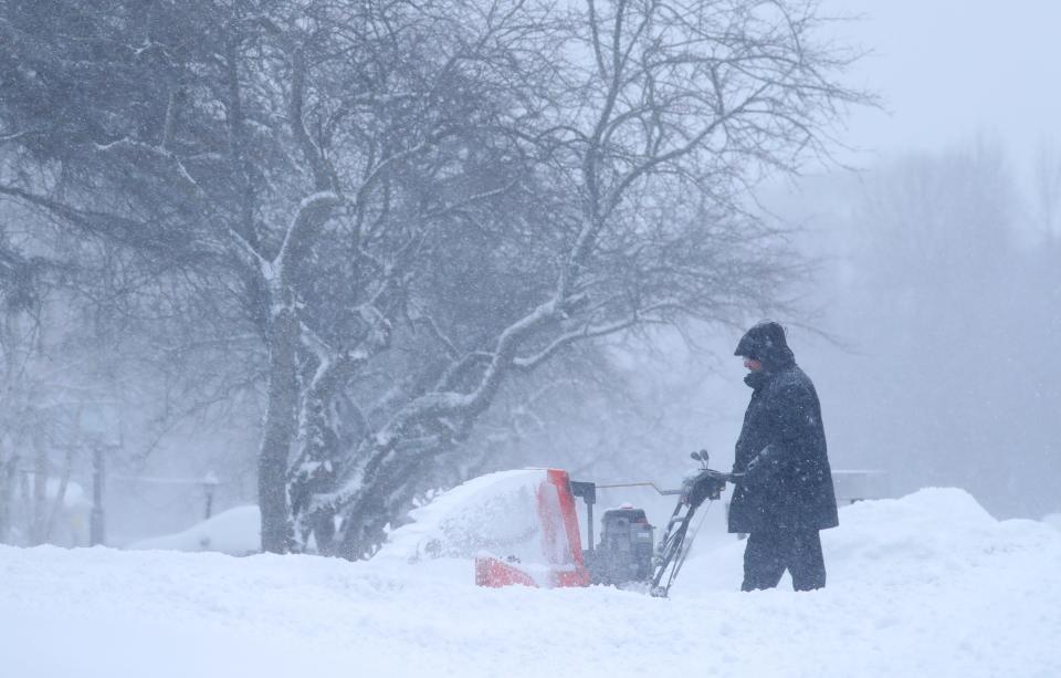 Joel Berman uses a snowblower to clear snow from his driveway Sunday, Jan. 31, 2021 in Bayside, Wis. The National Weather Service has issued a winter storm warning for the Milwaukee metro area as well as counties along the Illinois border where 5 to 9 inches of snow was expected to fall by the time the storm moves out of the area by Monday. 