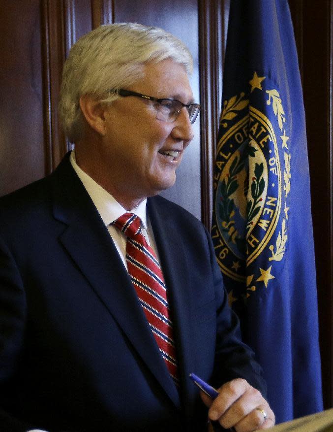 New Hampshire Senate President Chuck Morse smiles after signing a proclamation in the executive council chamber at the Statehouse, Wednesday, Jan. 4, 2017, in Concord, N.H. For two days only, Senate President Morse is New Hampshire's governor. The Republican landed in the state's top job due to a unique political time, with Maggie Hassan resigning to become a U.S. Senator two days before Republican Gov.-elect Chris Sununu is officially sworn in. (AP Photo/Elise Amendola)