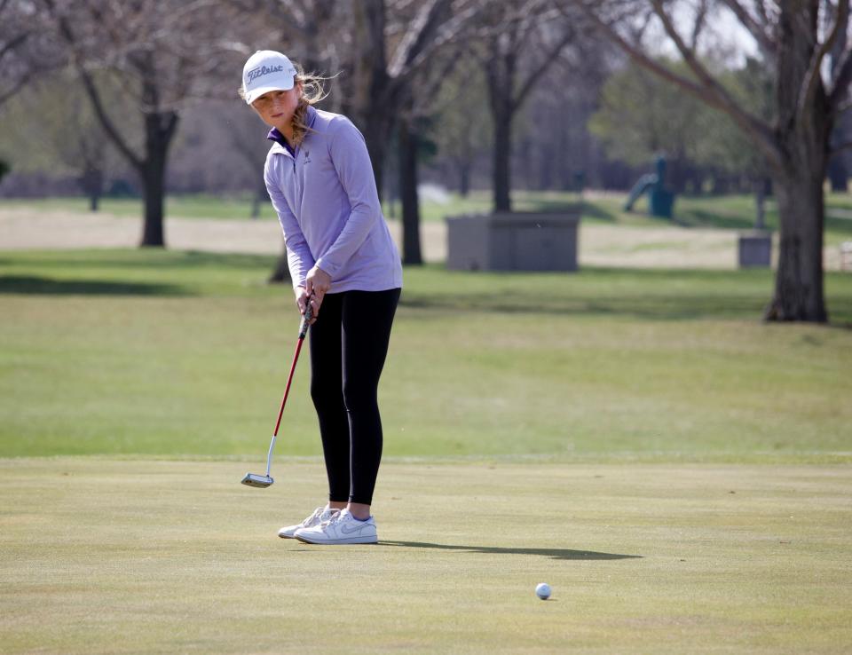 Watertown’s Avery Palmquist watches her putt on the third hole at Moccasin Creek Country Club during the Hub City Invite on Thursday, April 25, 2024.