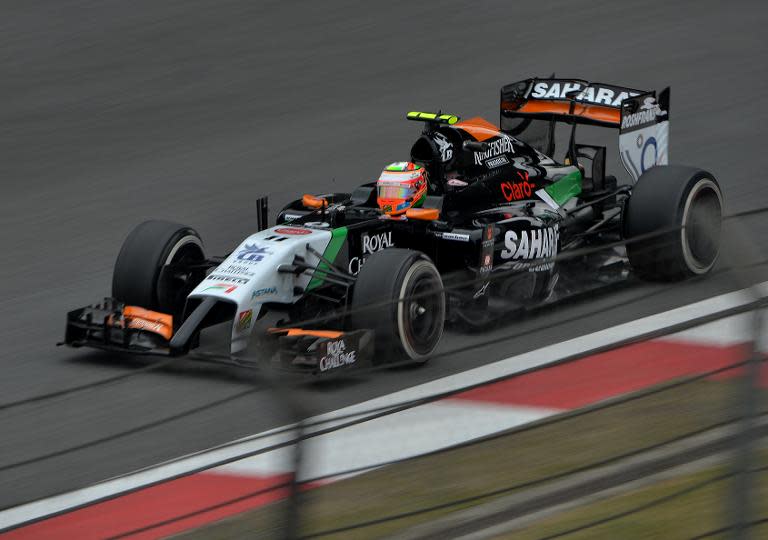 Sahara Force India driver Sergio Perez of Mexico powers his car on the main straight during the first practice session of the Formula One Chinese Grand Prix in Shanghai on April 18, 2014