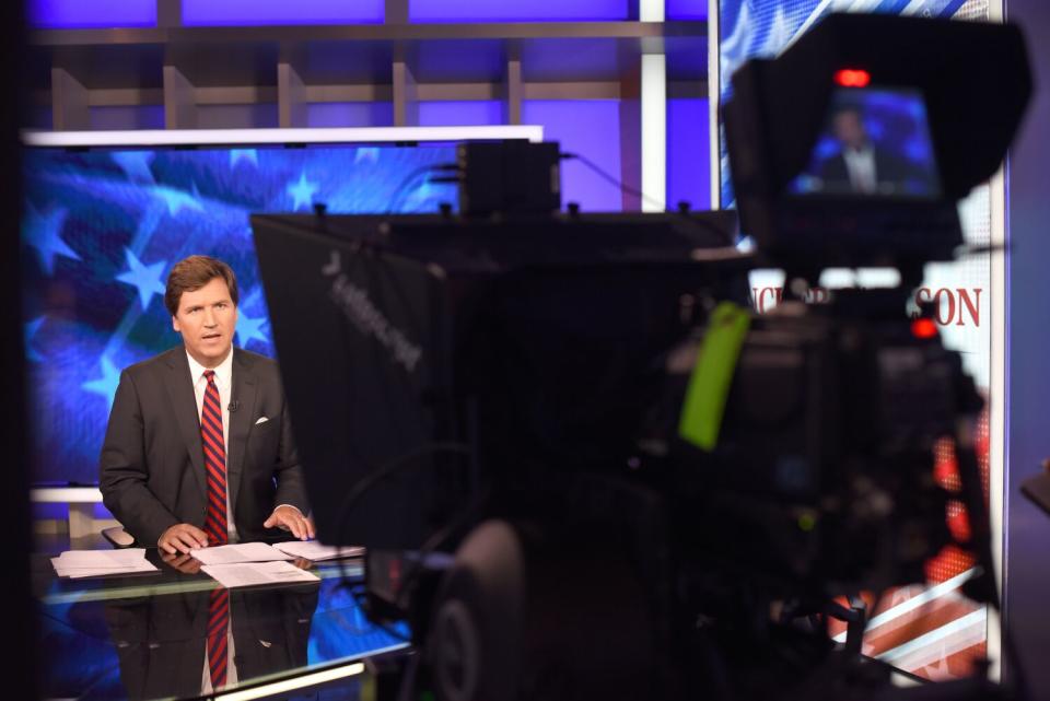 Tucker Carlson on his show on Fox News in New York in 2018. Photo by Jennifer S. Altman/For The Times