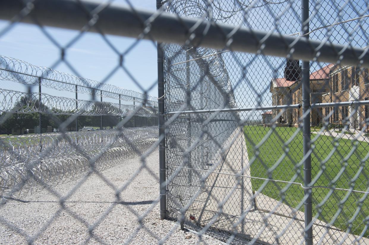 Fences and barbed wire at the entrance of the El Reno Federal Correctional Institution in El Reno, Oklahoma, 16 July, 2015. (AFP via Getty Images)