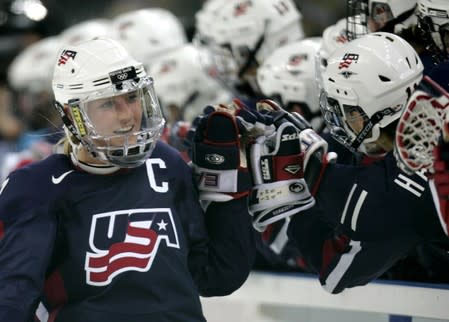 O: Wendell from the U.S. celebrates scoring third period goal against Finland in their women's ice hockey game at the Torino 2006 Winter Olympic Games