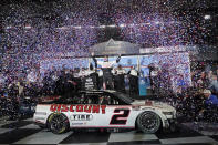 Austin Cindric celebrates in Victory Lane after winning the NASCAR Daytona 500 auto race at Daytona International Speedway, Sunday, Feb. 20, 2022, in Daytona Beach, Fla. (AP Photo/John Raoux)