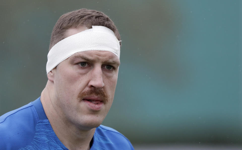 New Zealand's Brodie Retallick runs onto the pitch during a training session in Tokyo, Japan, Thursday, Oct. 17, 2019. The All Blacks play Ireland in a Rugby World Cup quarterfinal on Saturday Oct. 19. (AP Photo/Mark Baker)