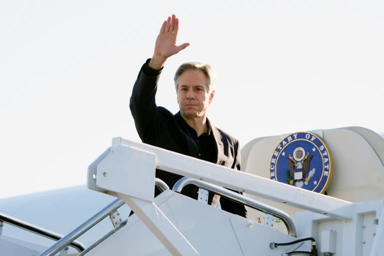US Secretary of State Antony Blinken waves as he boards his plane at Joint Base Andrews on his way to Beijing (Mark Schiefelbein)