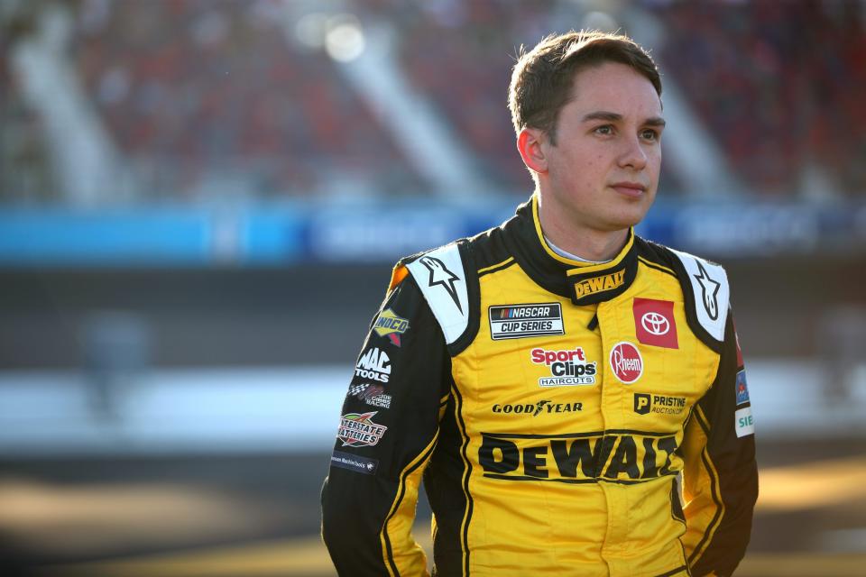 AVONDALE, ARIZONA - NOVEMBER 06: Christopher Bell, driver of the #20 DEWALT Toyota, looks on during qualifying for the NASCAR Cup Series Championship at Phoenix Raceway on November 06, 2021 in Avondale, Arizona. (Photo by Meg Oliphant/Getty Images) | Getty Images