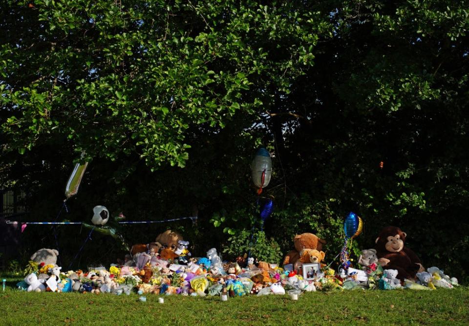 Tributes left at the scene in the Sarn area of Bridgend, south Wales, near to where five-year-old Logan Mwangi was found dead (Ben Birchall/PA) (PA Wire)