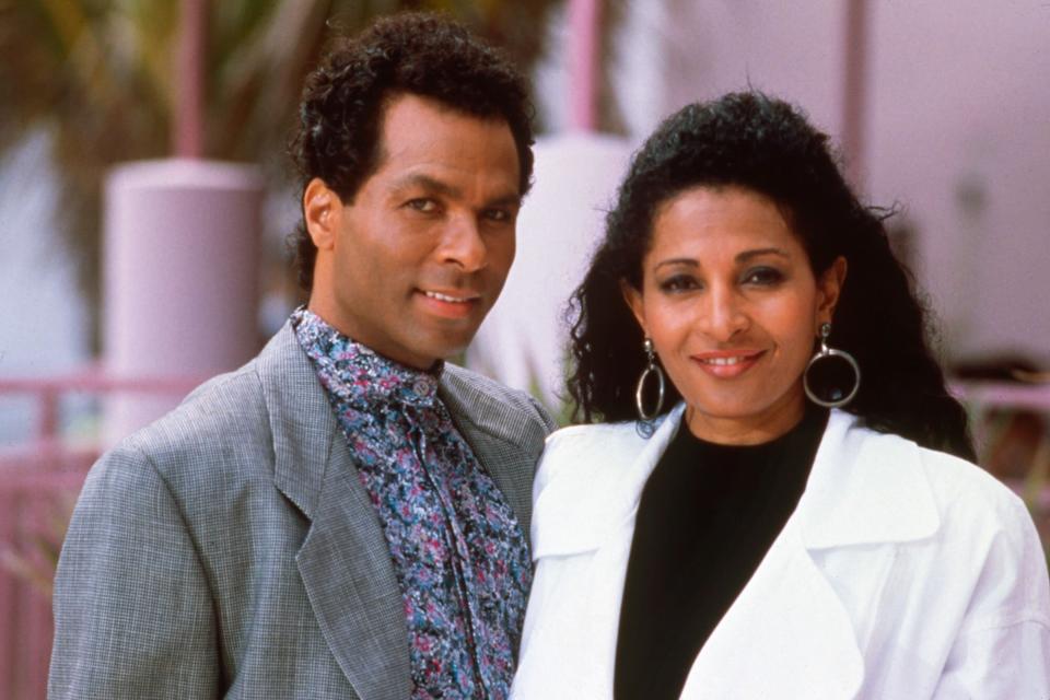 MIAMI VICE, from left: Philip Michael Thomas, Pam Grier, ‘Too Much, Too Late', (Season 5, ep. 521, aired Jan. 25, 1990)