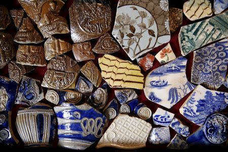 A variety of ceramic objects which have been excavated from the River Thames by mudlark Jason Sandy are displayed at his home in London, Britain June 01, 2016. REUTERS/Neil Hall