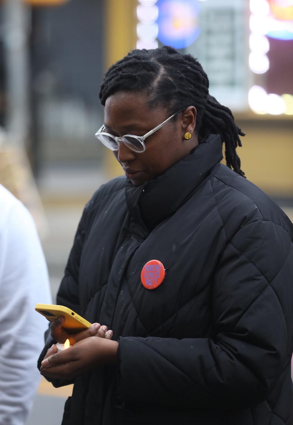 Stanley Martin after talking about the push to have Daniel's Law passed reads the names of people killed by Rochester Police since the mid 1970s.