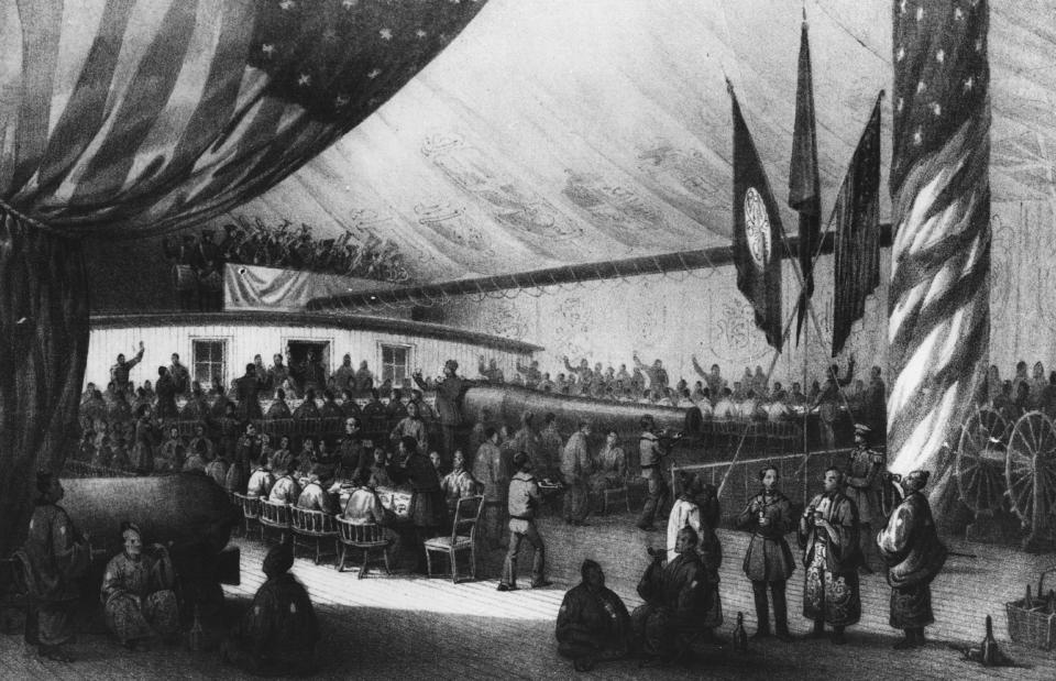 circa 1853: illustration of a dinner given in honor of the Japanese Commissioner on board the USSF Powhatan, during the naval expedition led by the US naval officer Matthew Galbraith Perry (1794 - 1858).