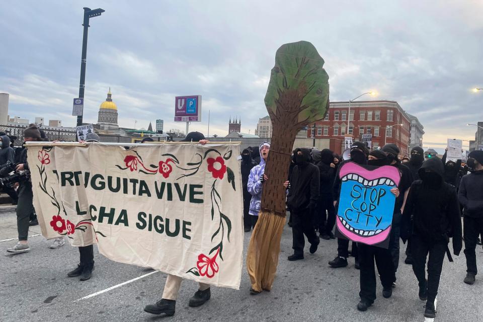 Demonstrators protest the death of an environmental activist, who went by Tortuguita, in Atlanta on Saturday, Jan. 21, 2023. Tortuguita was killed Wednesday, Jan. 18, after authorities said the 26-year-old shot a state trooper.