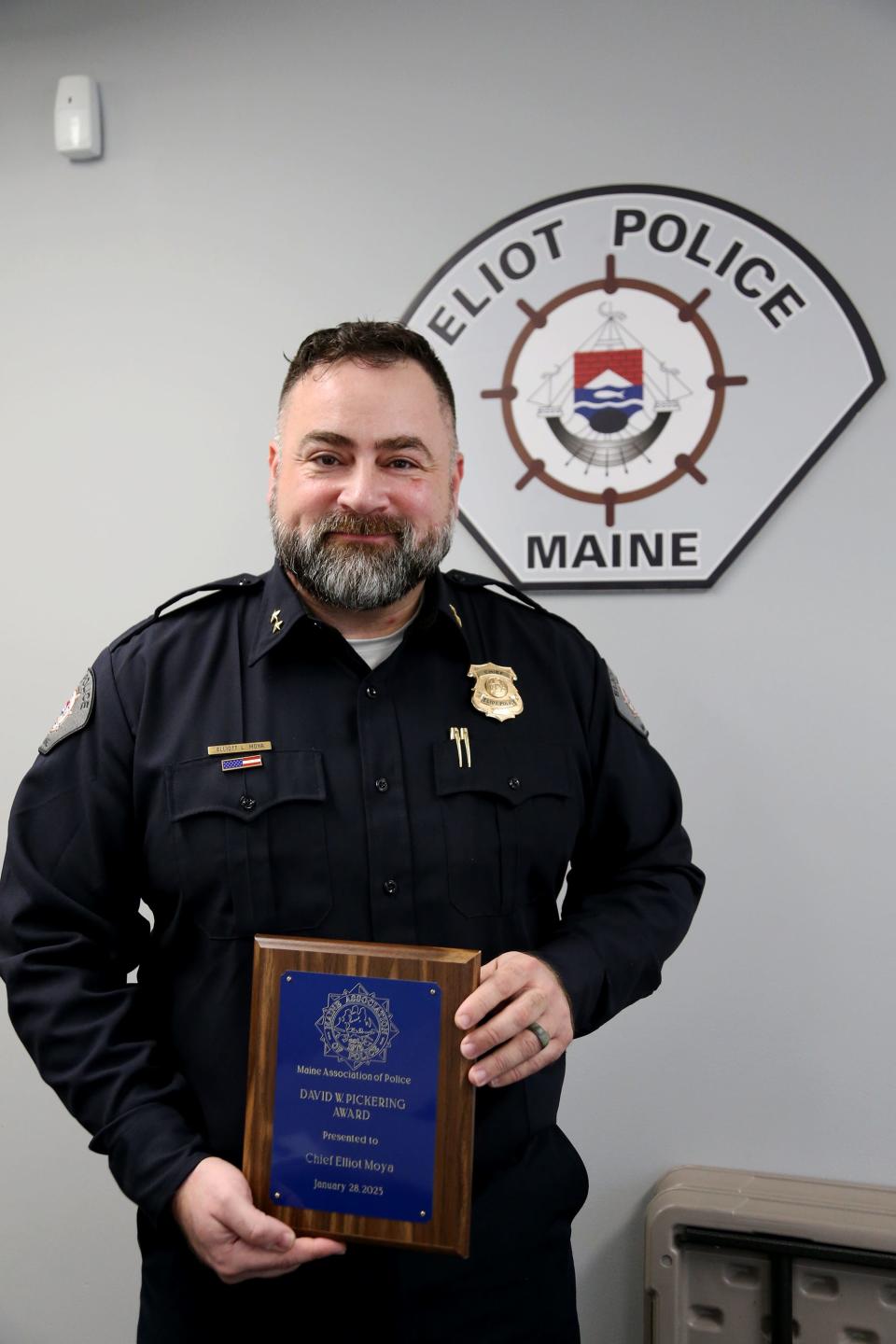 Eliot Police Chief Elliott Moya, seen Tuesday, Jan. 31, 2023, thanks his department after receiving Maine Chief of the Year honors.
