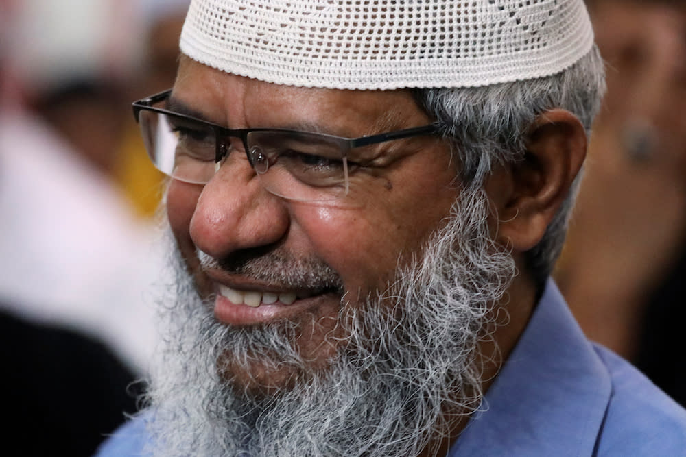 Indian Islamic preacher Dr Zakir Naik reacts during a prayer at a mosque in Melaka September 7, 2019. — Reuters pic