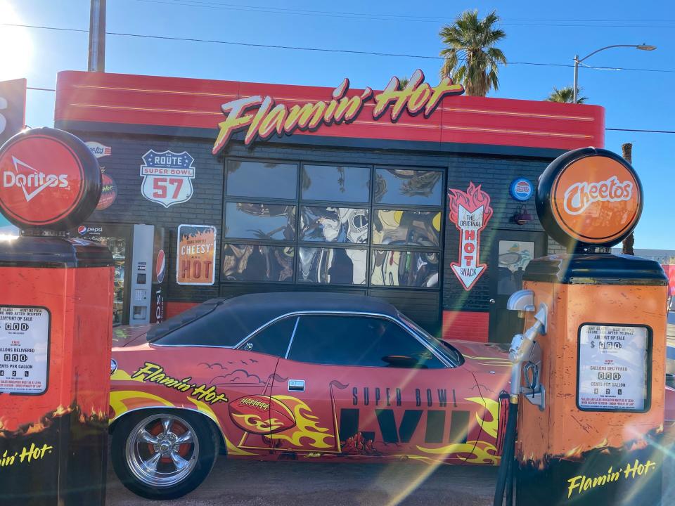 The Flamin Hot Cheetos gas station at the Tost by Tostitos pop-up is a cute spot to take pictures with friends.