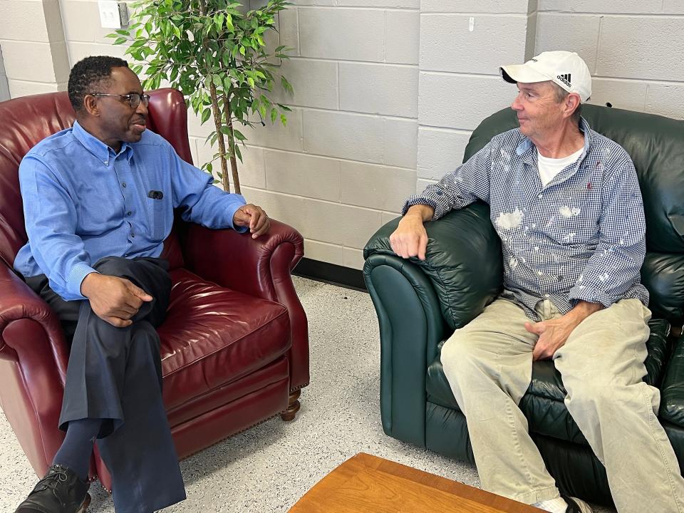 Tony Reddick, superintendent of Gadsden City Schools, and Eddie Nichols of Breakaway Ministries discuss plans to put a parent engagement center, funded through a federal grant the school system received, in Breakaway's Megan Kelley Dream Center on Black Creek Road.
