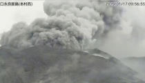 In this image from a surveillance camera released by Japan Meteorological Agency, a smoke column rises after an eruption of Shindake volcano in Kuchinoerabu island, southern Japan, Thursday, Jan. 17, 2019. Japan Meteorological Agency said Thursday’s eruption of Shindake volcano caused volcanic rocks flying out of the crater and pyroclastic flows pouring down but have not reached as far as the residential area 2 kilometers (1.2 mile) away. (Japan Meteorological Agency via AP)