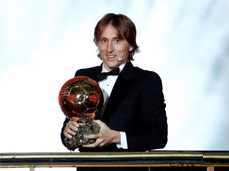 Soccer Football - 63rd Ballon d'Or - The Grand Palais, Paris, France - December 3, 2018 Real Madrid's Luka Modric with the Ballon d'Or award REUTERS/Benoit Tessier