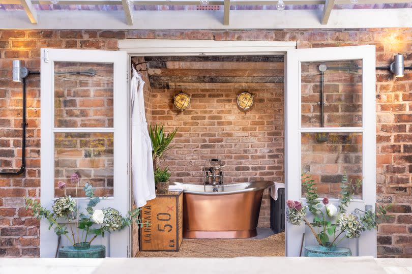 The copper bath in the outdoor shed -Credit:Cheshire Boutique Barns