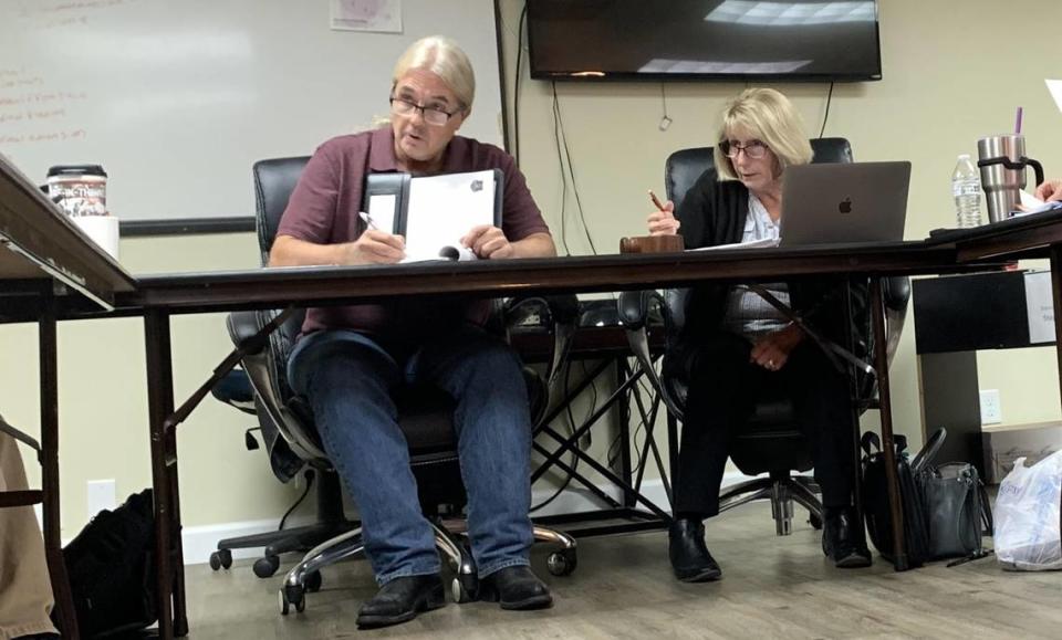 Western Cass Fire Protection District Secretary Chris Johnson, left, and Board President Sue Hosterman during the October 2023 meeting of the fire district board of directors.