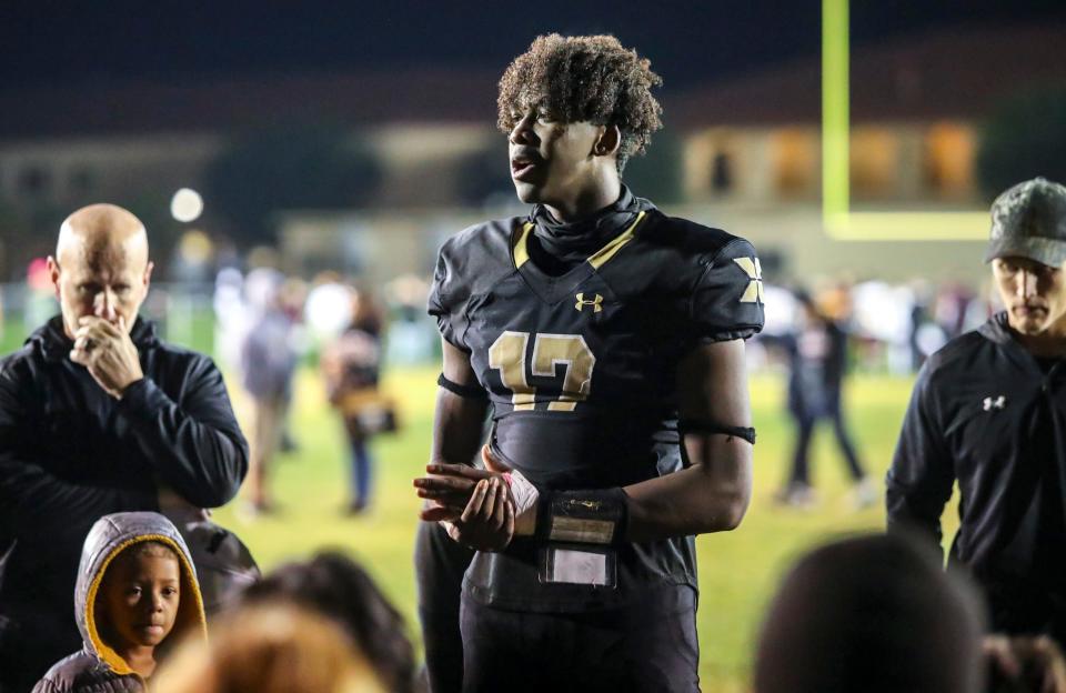 Xavier Prep's Kyle Hill (17) addresses his team after their CIF-SS Division 10 semifinal loss at Xavier College Preparatory High School in Palm Desert, Calif., Friday, Nov. 17, 2023.