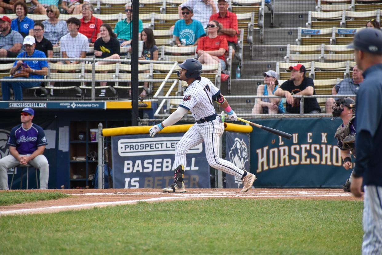 Jaison Andujar finishes his swing against the Jackson Rockabillys at Robin Roberts Stadium on July 20, 2024.