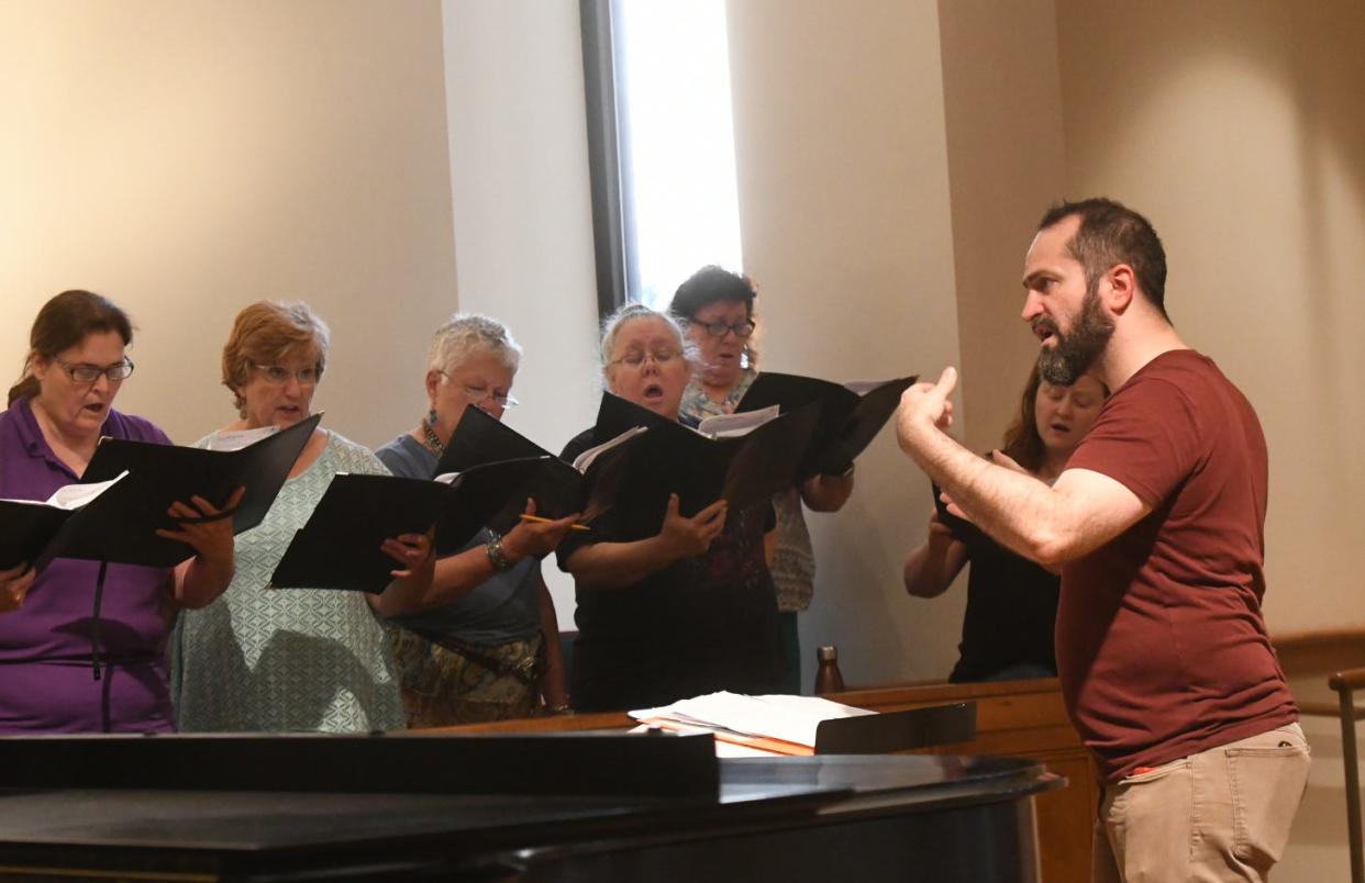 Red River Chorale director Jacob Wittkopp directs members during a rehearsal held last Tuesday. The Chorale will present the final concert of their seventeenth season Thursday (May 16) at First Presbyterian Church, 357 Windermere Blvd.