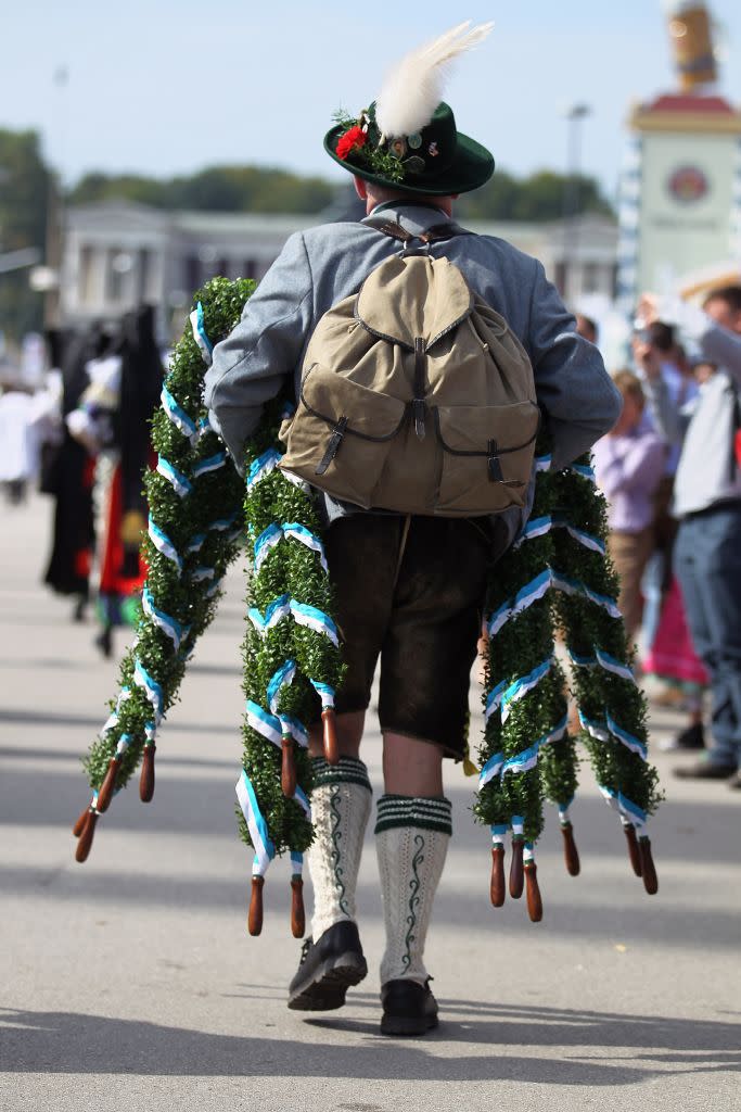 A man in traditional Bavarian attire is seen at the Oktoberfest in Munich.