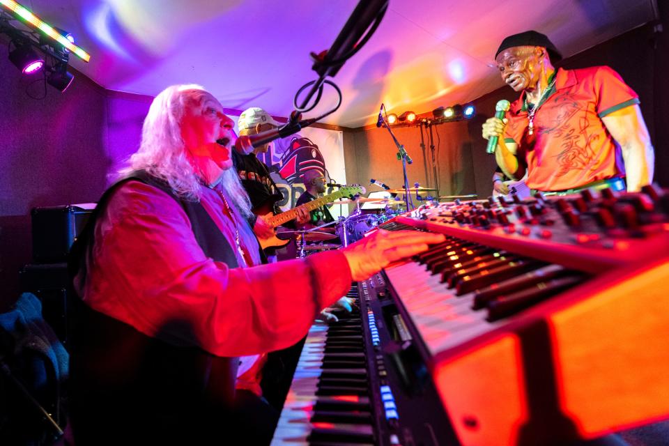 Keyboardist Michael Henderson, left, and lead singer Fred Booker perform with Soul Express at the Moose Lodge in Beech Grove.