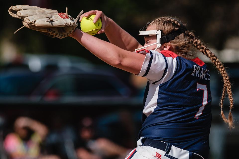 Indian Valley's Mia Rose delivers a pitch during the Division II District softball semifinal against Dover.