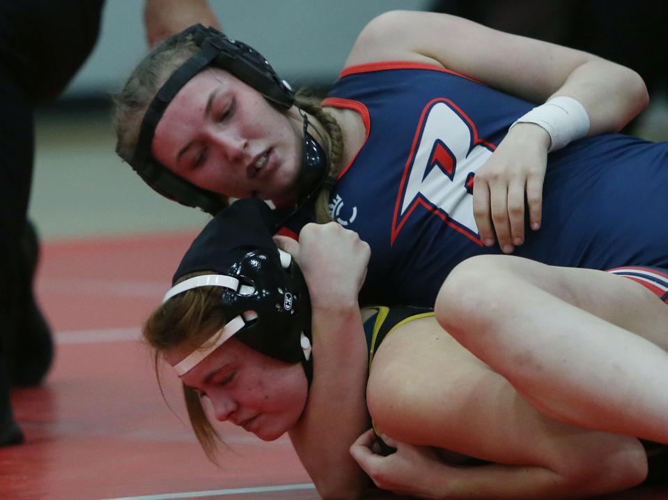 Ballard's Ayla Ott competes against West Marshall's Savannah Perry during the Ballard Scramble girls wrestling meet Monday at Ballard High School in Huxley.