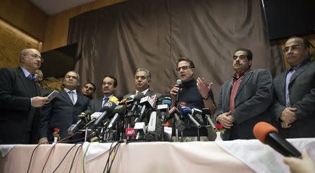 German conservator Christian Eckmann (3rd R) speaks during a news conference after the mask of King Tutankhamun was found to have been damaged and glued back together, at the Egyptian Museum in Cairo January 24, 2015. REUTERS/Staff