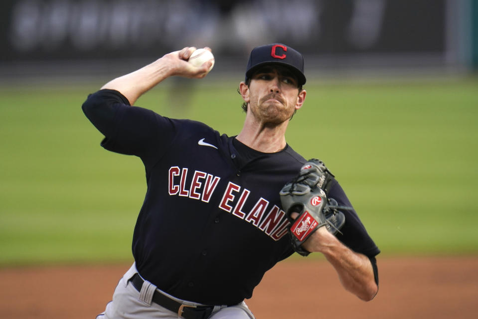 Cleveland Indians pitcher Shane Bieber throws against the Detroit Tigers in the third fourth inning of a baseball game in Detroit, Saturday, Aug. 15, 2020. (AP Photo/Paul Sancya)