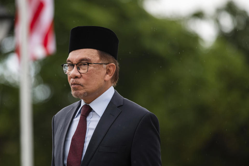 Malaysian Prime Minister Anwar Ibrahim attends a wreath-laying ceremony at Rizal Park in Manila, Philippines Thursday, March 2, 2023. (Lisa Marie David/Pool Photo via AP)