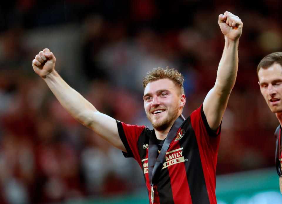 FILE - In this Saturday, Dec. 8, 2018 file photo, Atlanta United defender Julian Gressel (24) reacts as he makes his way onstage for the trophy presentation after defeating the Portland Timbers 2-0 to win during the MLS Cup soccer championship in Atlanta. Atlanta United surrendered another big part of its MLS Cup-winning squad, trading midfielder Julian Gressel to D.C. United on Tuesday, Jan. 21, 2020 after failing to reach agreement on a new contract. (AP Photo/John Bazemore, File)