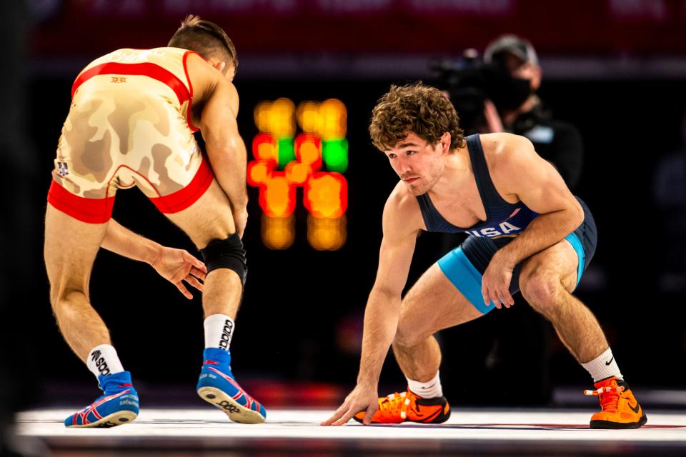 Daton Fix, right, wrestles Vitali Arujau at 57 kg during the second session of the USA Wrestling Olympic Team Trials, Friday, April 2, 2021, at Dickies Arena in Fort Worth, Texas.