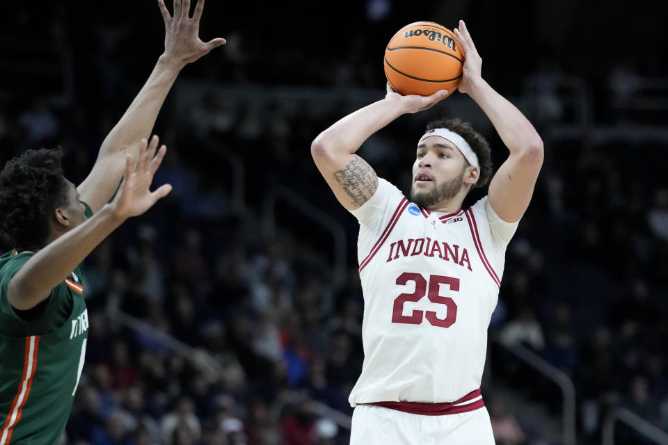 Indiana's Race Thompson (25) shoots for three points in the first half of a second-round college basketball game against Miami in the NCAA Tournament, Sunday, March 19, 2023, in Albany, N.Y. (AP Photo/John Minchillo)