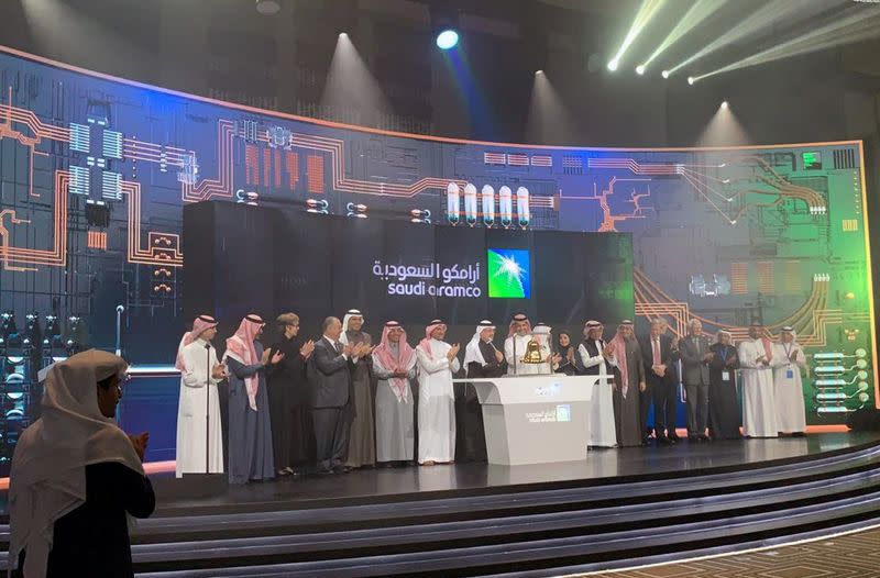 Participants attend the official ceremony marking the debut of Saudi Aramco's IPO on the Riyadh's stock market, in Riyadh